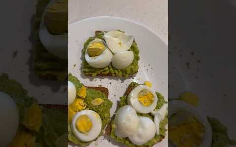 Simple breakfast. ￼ bread and avocado spread with eggs.